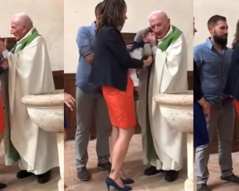 baptême bébé curé prêtre gifle giffles